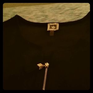 I'm selling and Anne Klein old vintage blouse